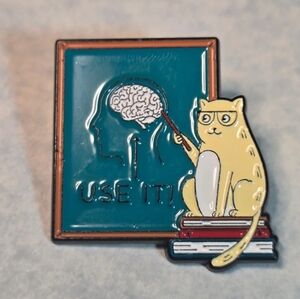 Cat Teacher "Use It!" Brain Enamel Pin – Scholarly Kitten on Books